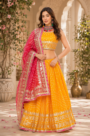 Yellow shade kotta checks jaipuri lehenga.